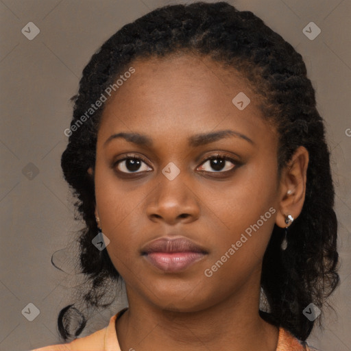 Neutral black young-adult female with medium  black hair and brown eyes