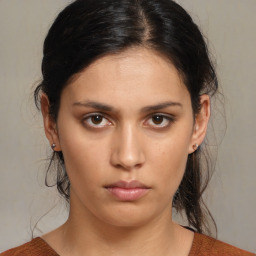 Neutral white young-adult female with medium  brown hair and brown eyes