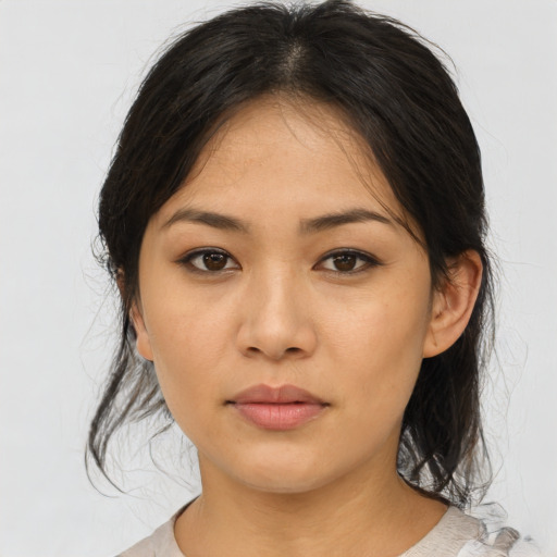 Neutral asian young-adult female with medium  brown hair and brown eyes