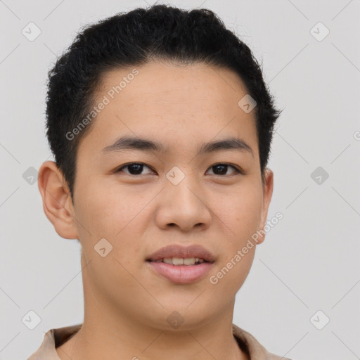 Joyful asian young-adult male with short  brown hair and brown eyes