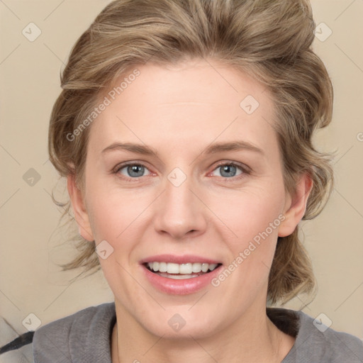 Joyful white young-adult female with medium  brown hair and blue eyes