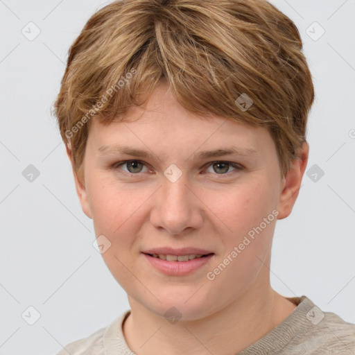 Joyful white young-adult female with short  brown hair and grey eyes