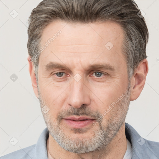 Neutral white adult male with short  brown hair and brown eyes