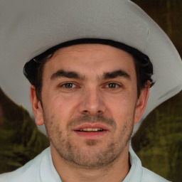 Joyful white adult male with short  brown hair and brown eyes
