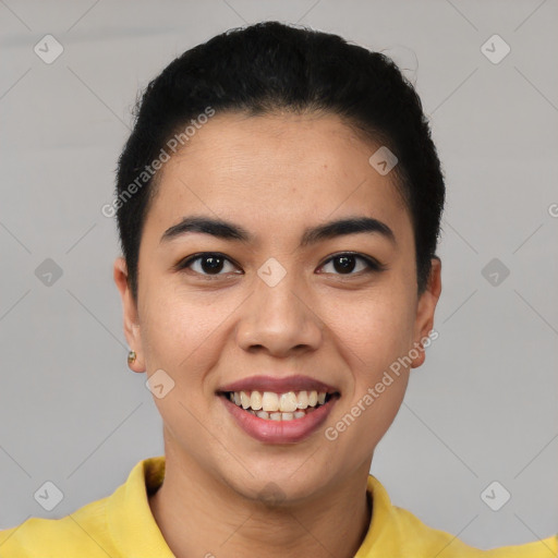 Joyful latino young-adult female with short  brown hair and brown eyes