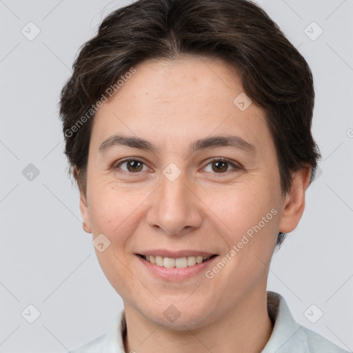 Joyful white young-adult female with short  brown hair and brown eyes