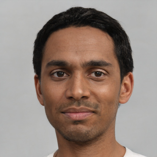 Neutral black young-adult male with short  black hair and brown eyes