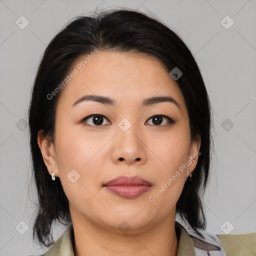 Joyful asian young-adult female with medium  black hair and brown eyes