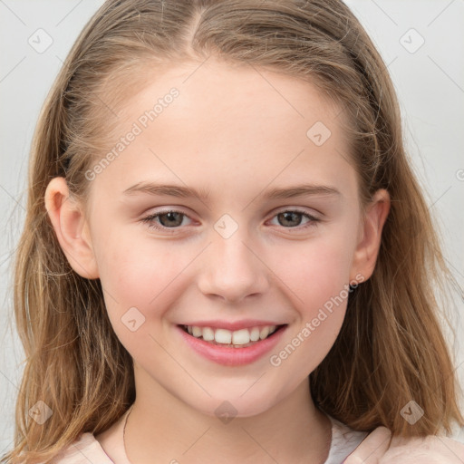 Joyful white child female with long  brown hair and grey eyes