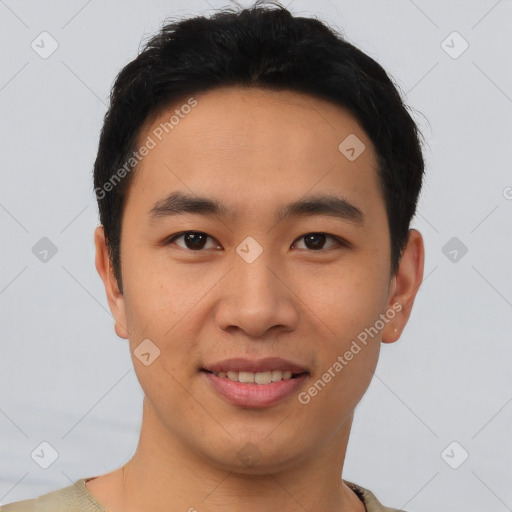 Joyful asian young-adult male with short  brown hair and brown eyes