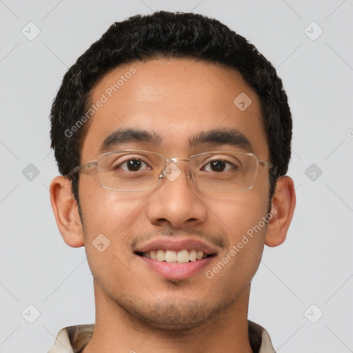 Joyful latino young-adult male with short  brown hair and brown eyes