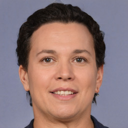Joyful white adult female with short  brown hair and brown eyes