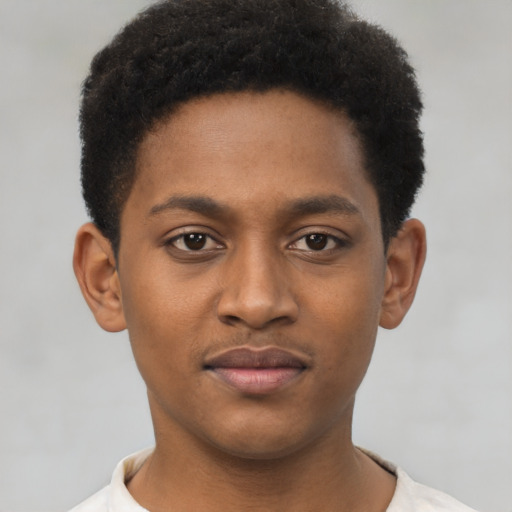 Joyful latino young-adult male with short  brown hair and brown eyes