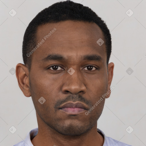 Neutral black young-adult male with short  black hair and brown eyes