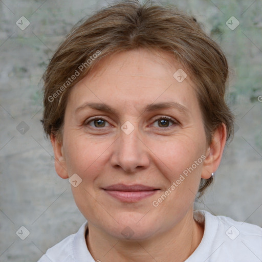 Joyful white adult female with short  brown hair and brown eyes