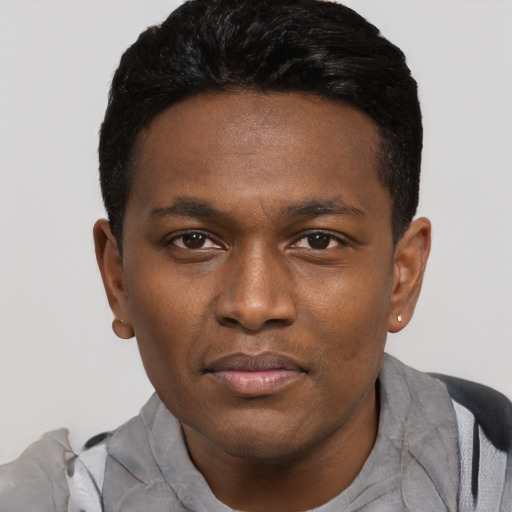 Neutral black young-adult male with short  black hair and brown eyes