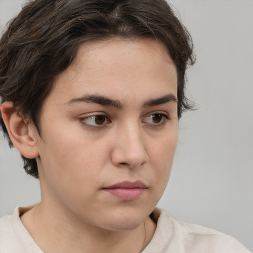 Neutral white young-adult female with short  brown hair and brown eyes