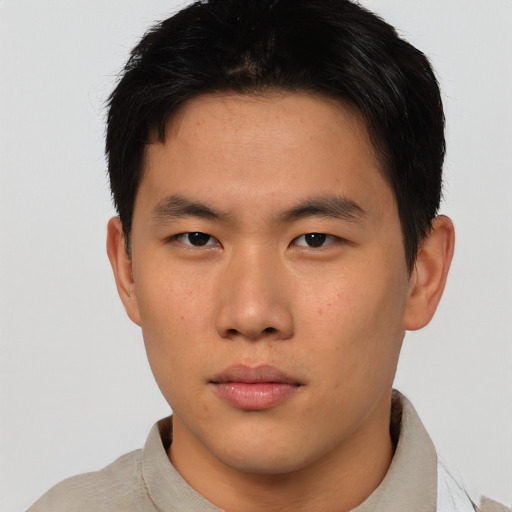 Neutral asian young-adult male with short  brown hair and brown eyes