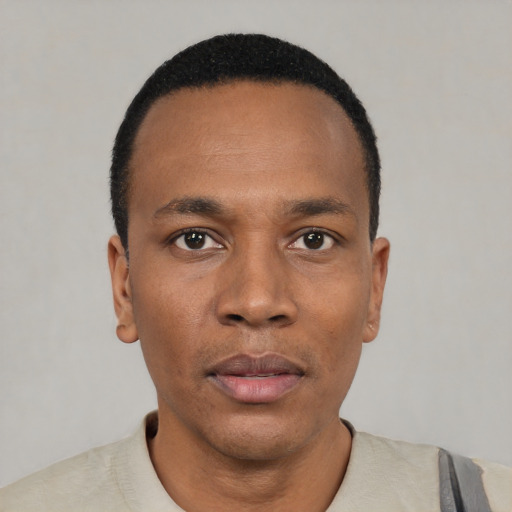 Neutral black young-adult male with short  black hair and brown eyes