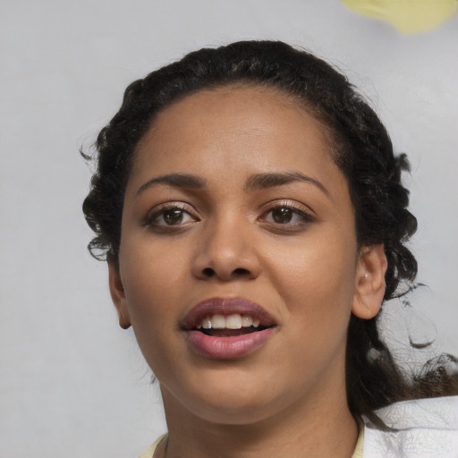 Joyful latino young-adult female with medium  black hair and brown eyes