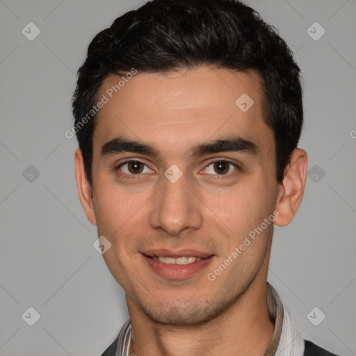 Joyful white young-adult male with short  black hair and brown eyes