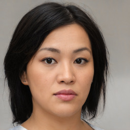 Neutral asian young-adult female with medium  black hair and brown eyes