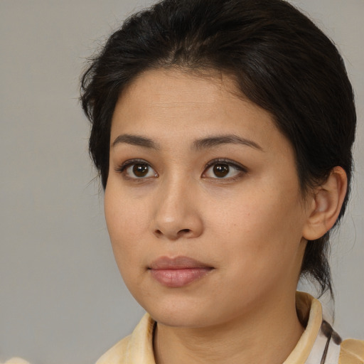 Neutral asian young-adult female with medium  brown hair and brown eyes
