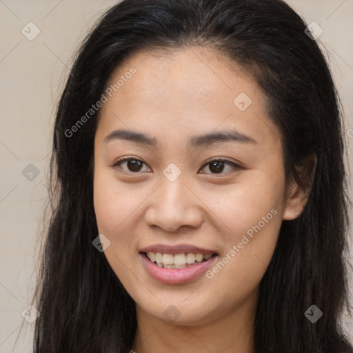 Joyful asian young-adult female with long  brown hair and brown eyes