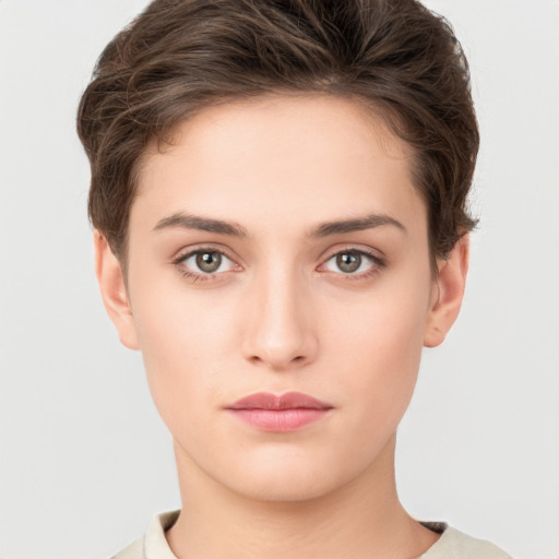 Neutral white young-adult female with short  brown hair and brown eyes