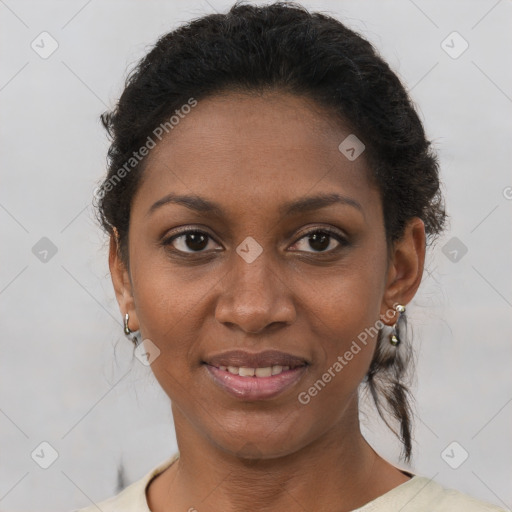 Joyful black young-adult female with short  brown hair and brown eyes