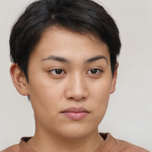 Neutral latino young-adult female with short  brown hair and brown eyes
