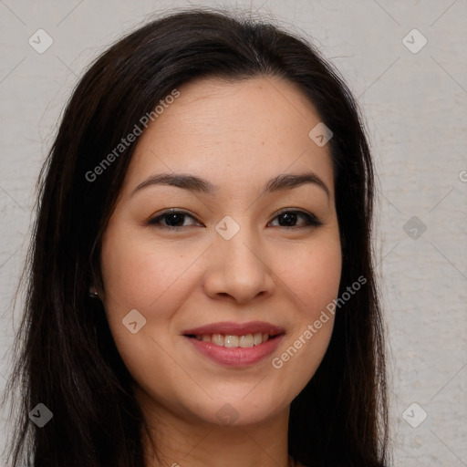 Joyful asian young-adult female with long  brown hair and brown eyes