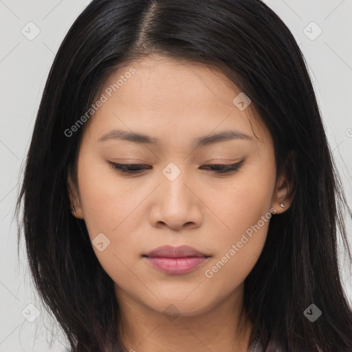 Joyful asian young-adult female with long  brown hair and brown eyes