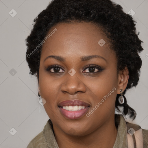 Joyful black young-adult female with long  brown hair and brown eyes