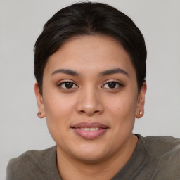 Joyful asian young-adult female with short  brown hair and brown eyes