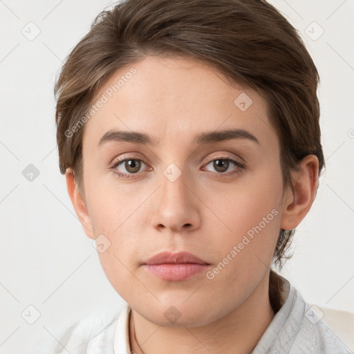 Neutral white young-adult female with short  brown hair and grey eyes