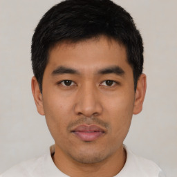 Neutral asian young-adult male with short  black hair and brown eyes