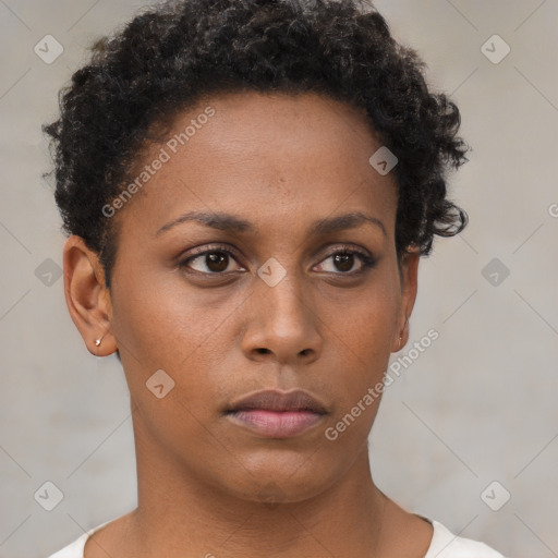 Neutral black young-adult female with short  brown hair and brown eyes