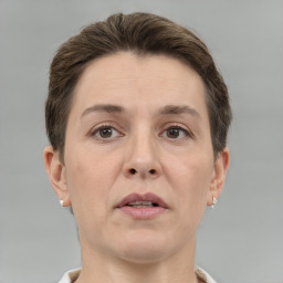 Neutral white adult female with short  brown hair and brown eyes