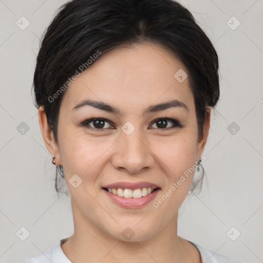 Joyful asian young-adult female with medium  brown hair and brown eyes