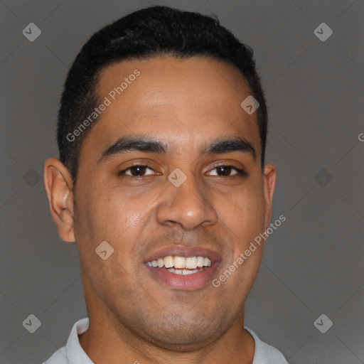 Joyful black young-adult male with short  brown hair and brown eyes