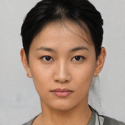 Neutral asian young-adult female with short  brown hair and brown eyes