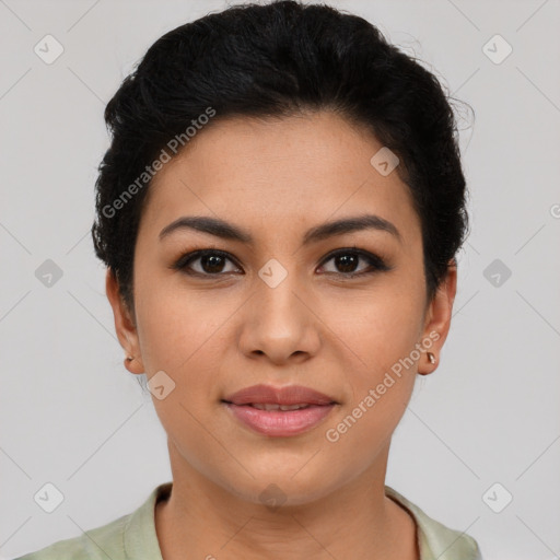 Joyful latino young-adult female with short  brown hair and brown eyes