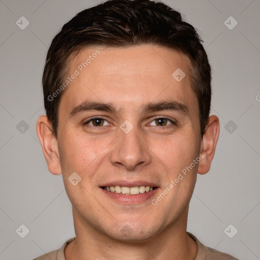 Joyful white young-adult male with short  brown hair and grey eyes