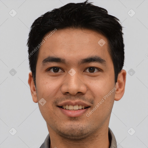 Joyful white young-adult male with short  black hair and brown eyes