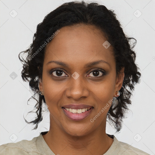 Joyful black young-adult female with long  brown hair and brown eyes