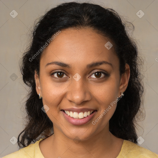 Joyful black young-adult female with medium  brown hair and brown eyes