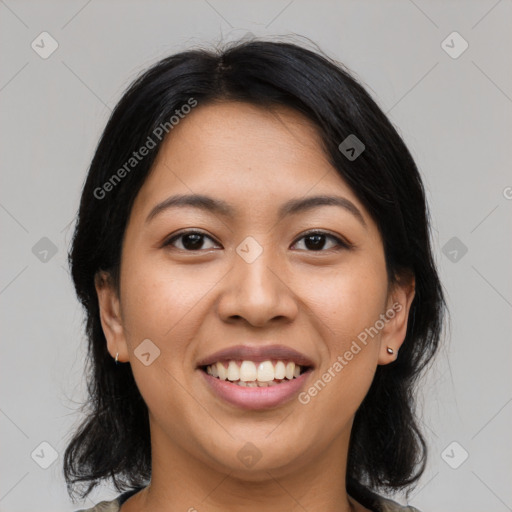 Joyful asian young-adult female with medium  black hair and brown eyes