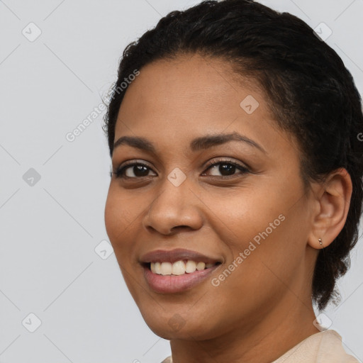 Joyful latino young-adult female with short  brown hair and brown eyes