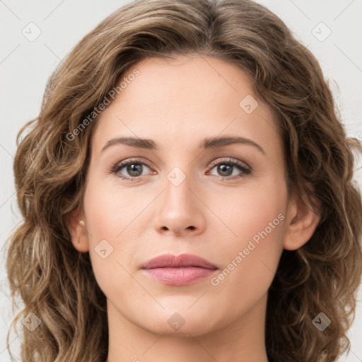 Joyful white young-adult female with long  brown hair and green eyes